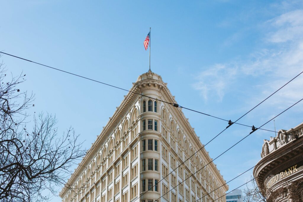 flag on the Flatiron Building lies within Financial District