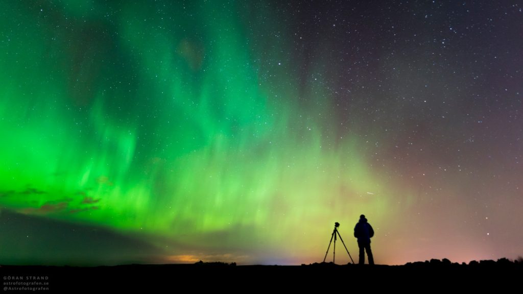Photographing the northern lights.