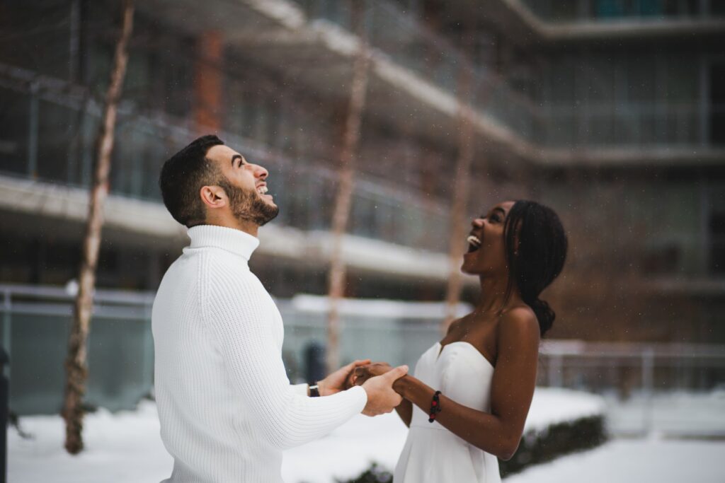 Bride and groom holding hands, enjoying the moment