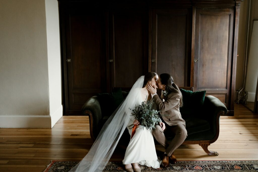 Bride holding a bouquet of white flowers