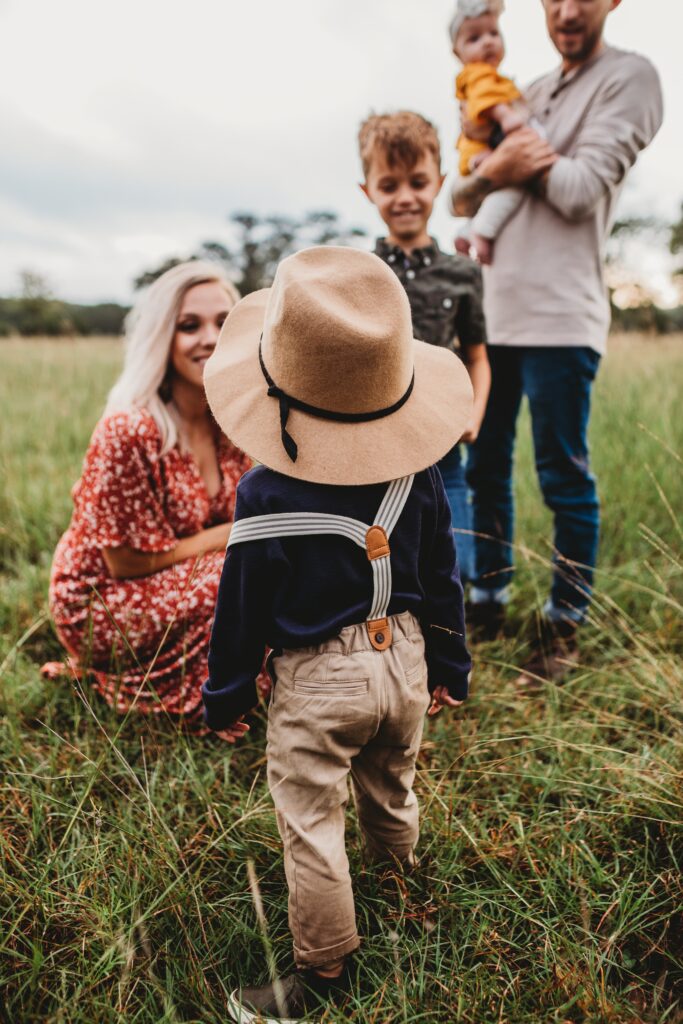 A family dressed casually for a photo shoot.