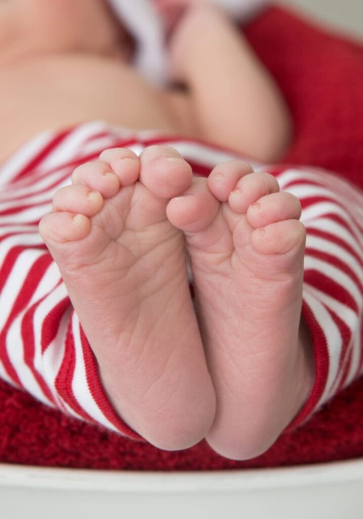 Focus on baby's hand and feet