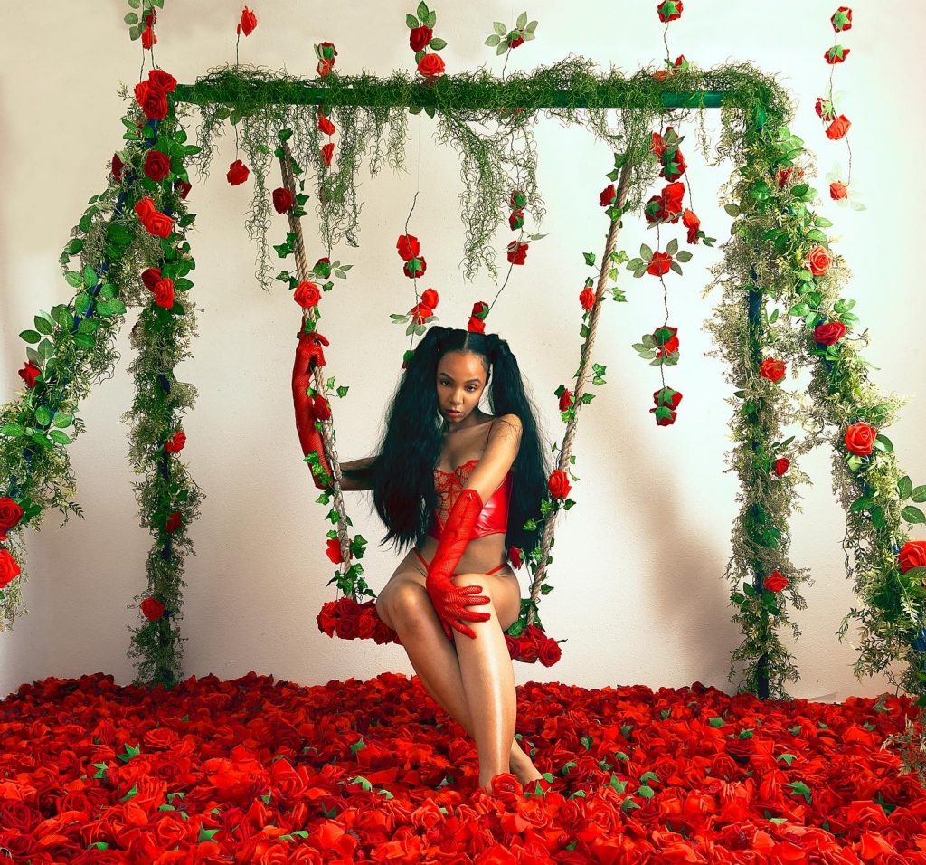 Black artist Kimberly Douglas in a rose set