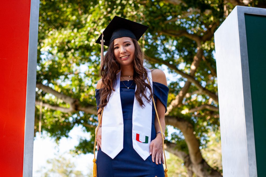 Add personal elements to wall-worthy graduation photos to print on glass