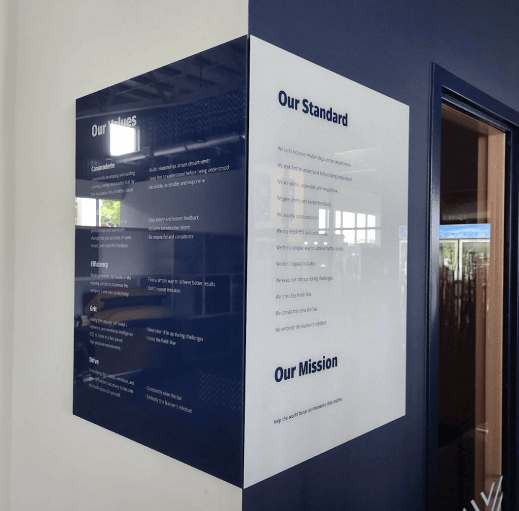 Use glass prints at the office to showcase core values and mission