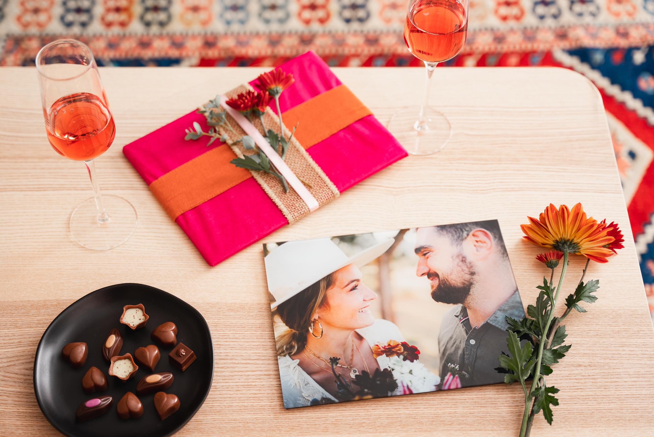 The modern 3rd anniversary gift of a glass print shines among other generic annversary gifts like chocolate and flowers